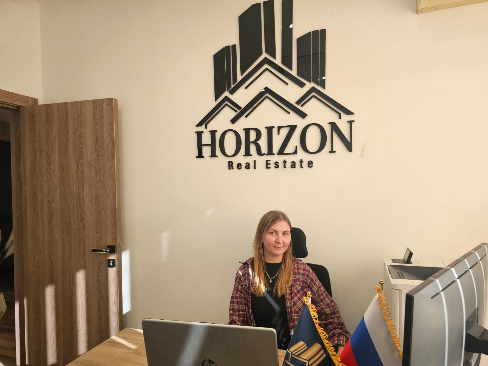 Property management team handling remote rental services for foreign owners
